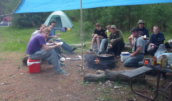 Group around Manitowish Waters campsite fire