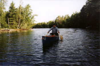 Mike demonstrating 2 paddle technique, lower Trout River (1998)